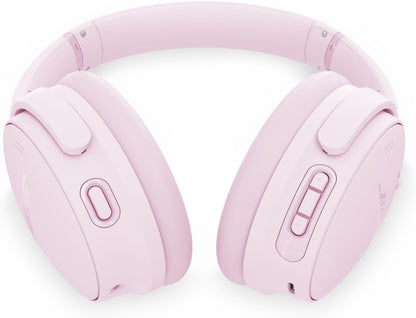 Pink headphones on a white background